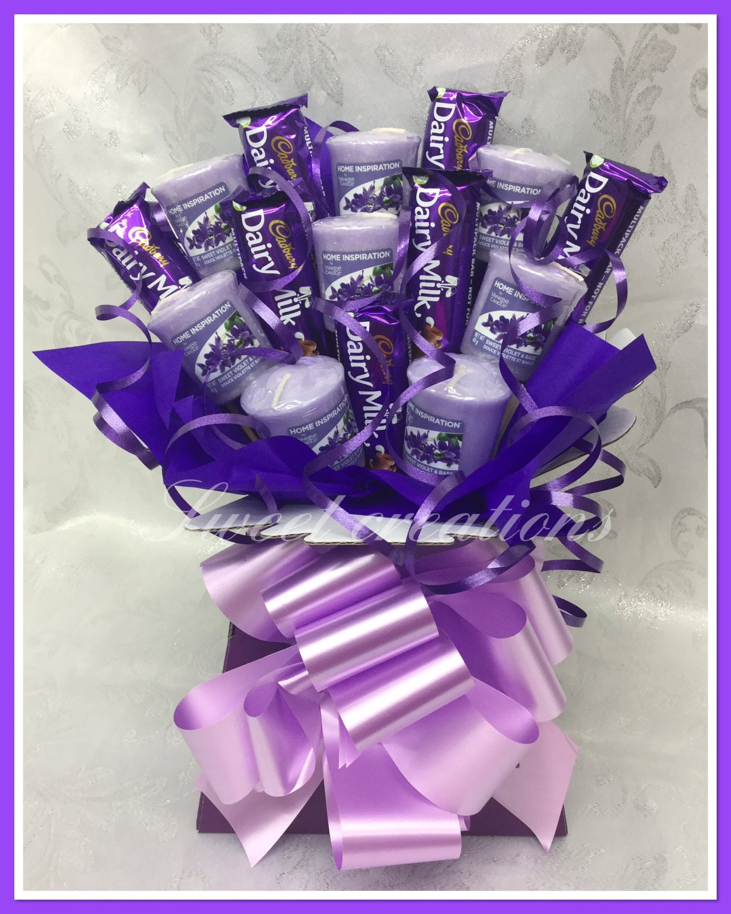 Chocolate and candle bouquet Ferrero rocher SWEET CREATIONS village candle Yankee candle tablecentre Christmas sweet hamper chocolate gift