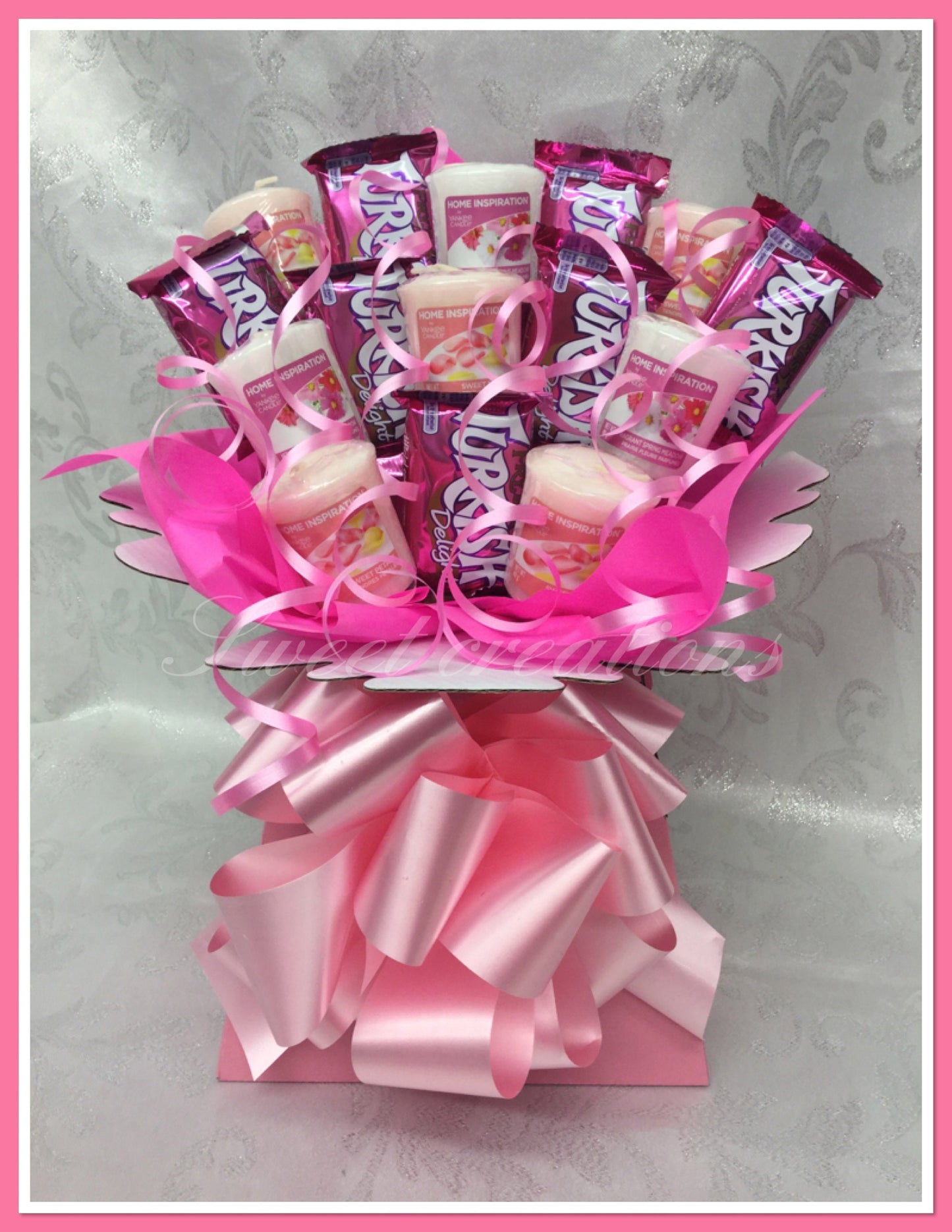 Chocolate and candle bouquet Ferrero rocher SWEET CREATIONS village candle Yankee candle tablecentre Christmas sweet hamper chocolate gift