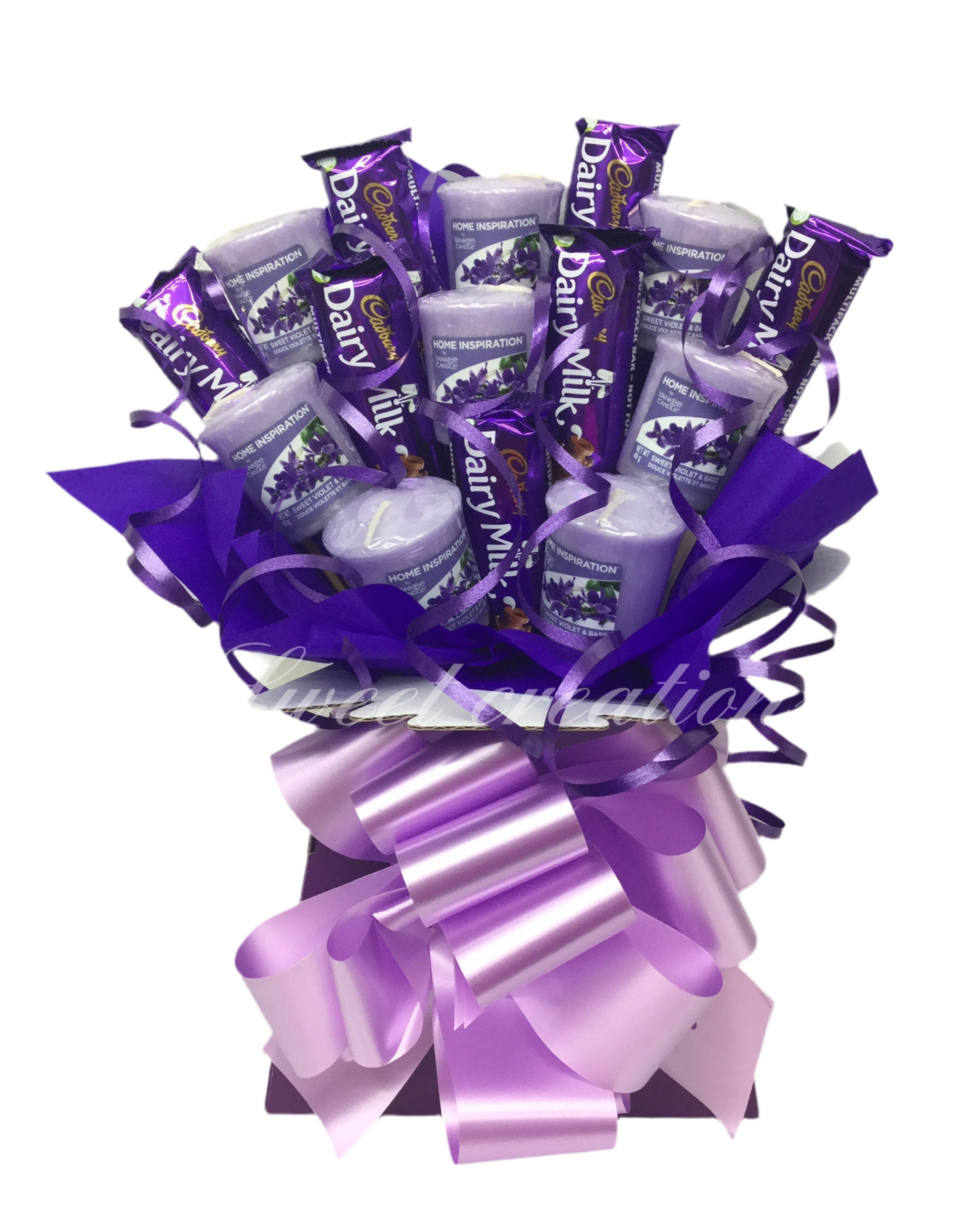 Chocolate and candle bouquet Ferrero rocher SWEET CREATIONS village candle Yankee candle tablecentre Christmas sweet hamper chocolate gift