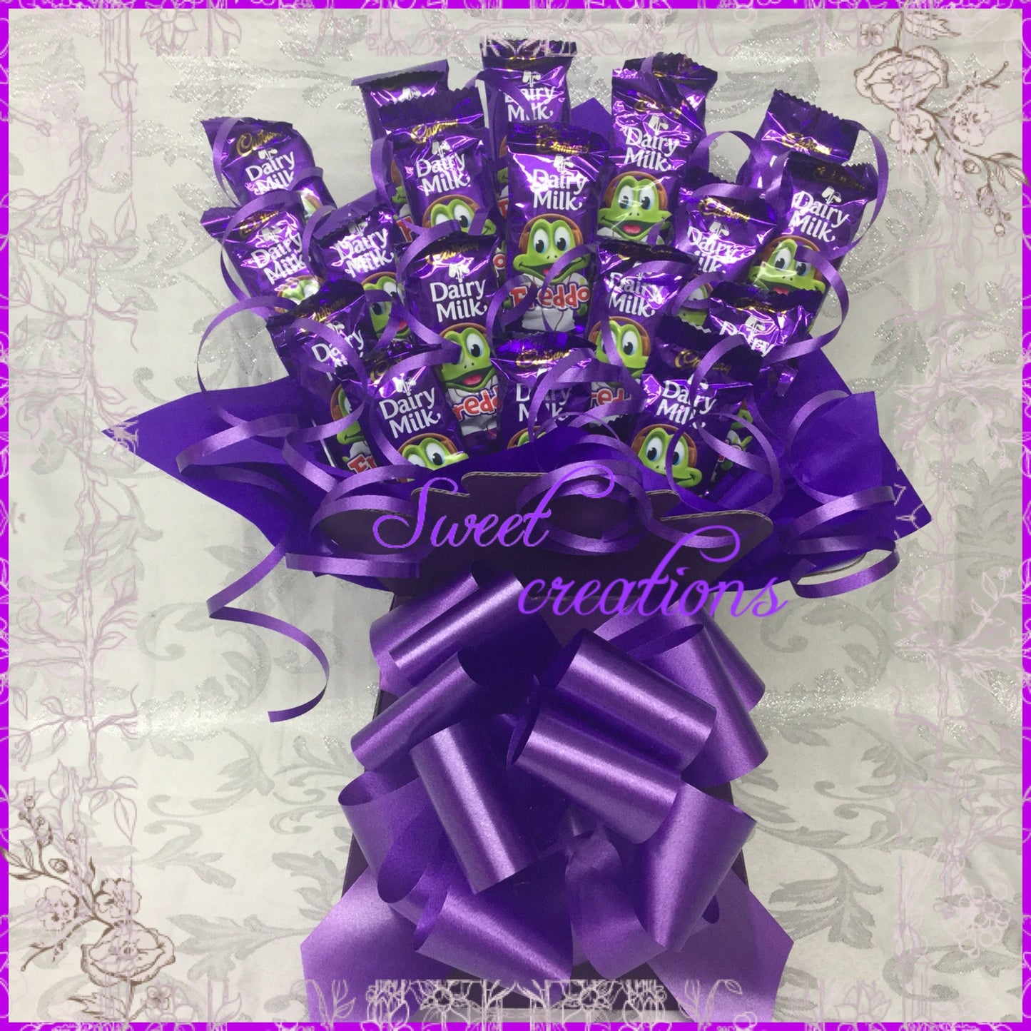 Dairy milk freddo chocolate bouquet  sweet creations Christmas tablecentre party birthday gift purple frog sweet hamper